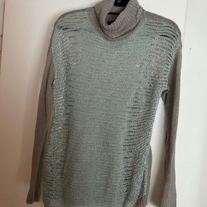 Metallic turtleneck, medium sized.